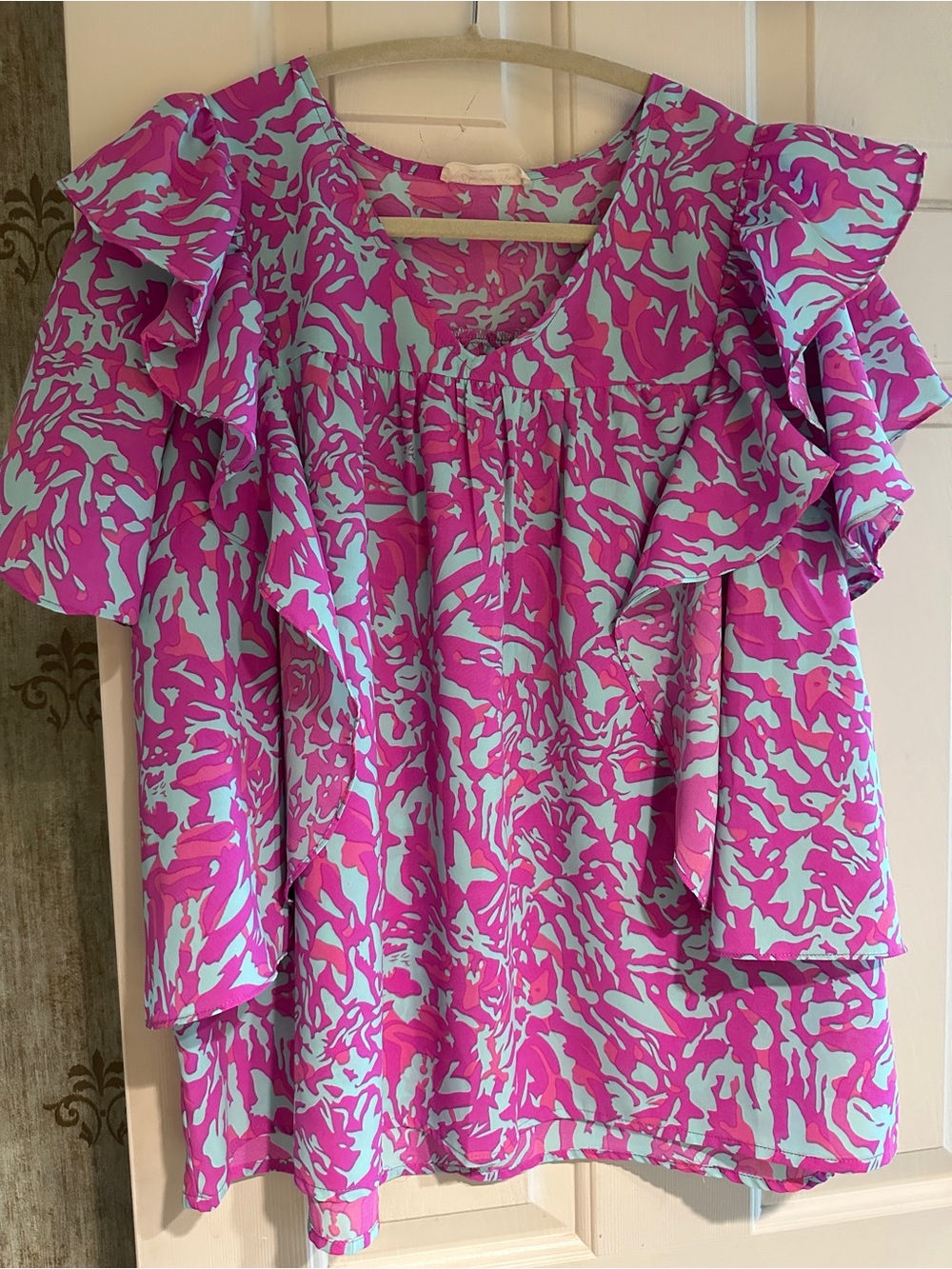 Fuchsia and light blue flowy top, with ruffling on front and back